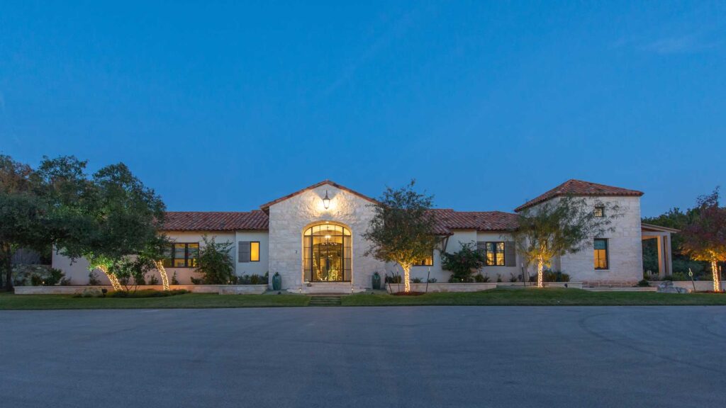 Bronze entrance doors in a Spanish colonial-style home