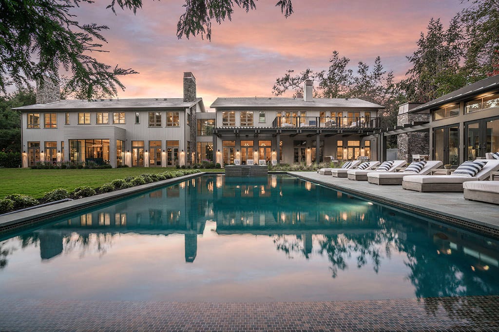 Beautiful home exterior with solid bronze windows & doors