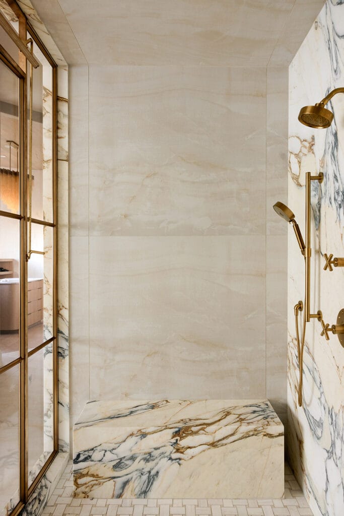 French-style doors providing unfettered access to a luxurious wet area with clean lines